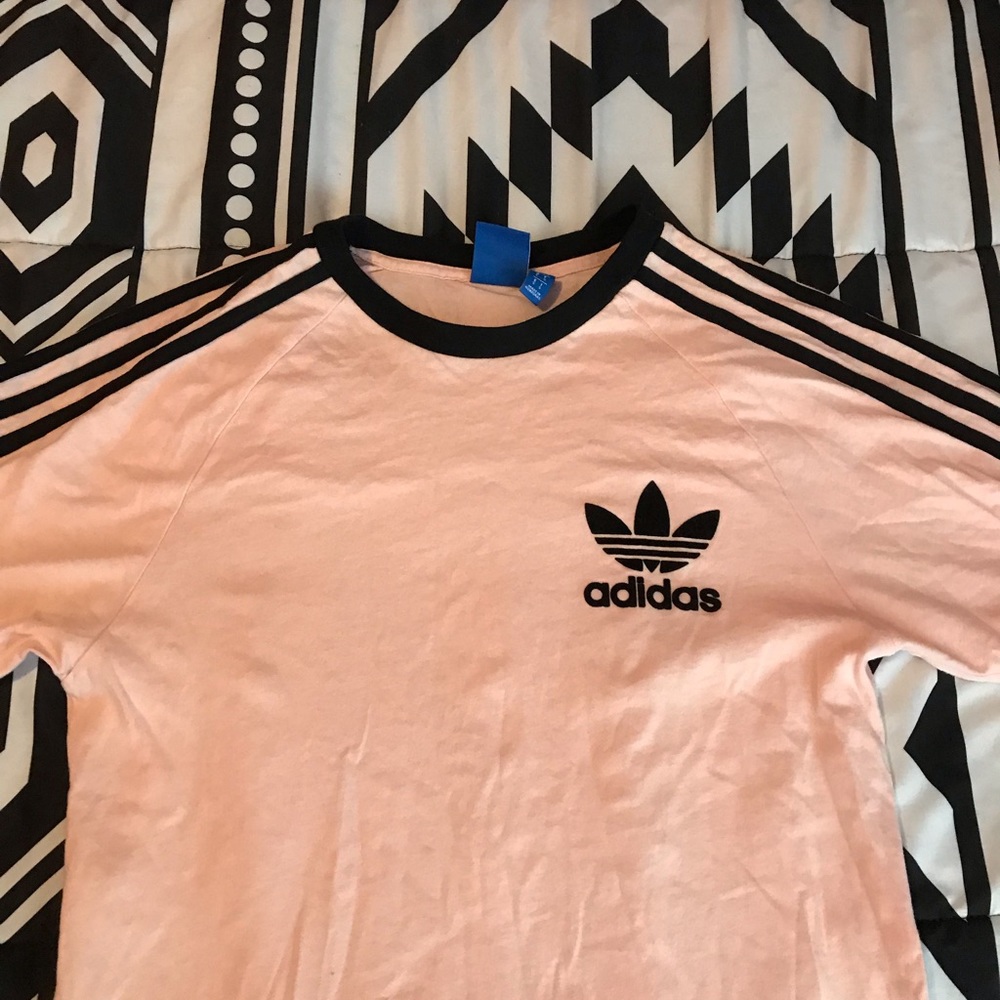 Adidas pink and black T-shirt.